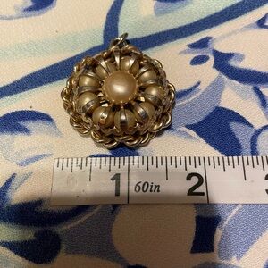 Faux pearl and gold tone necklace pendant